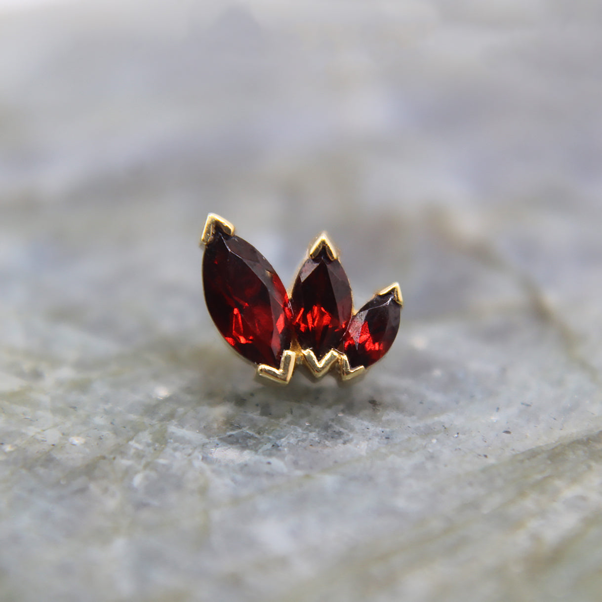 Garnet French Kiss. Three varying sized marquise garnet. Jewelry Stud. Yellow Gold. Earring. Cartilage Earring. Gold Jewelry. BVLA. Body Vision Los Angeles Jewelry. Brooklyn Piercing Jewelry