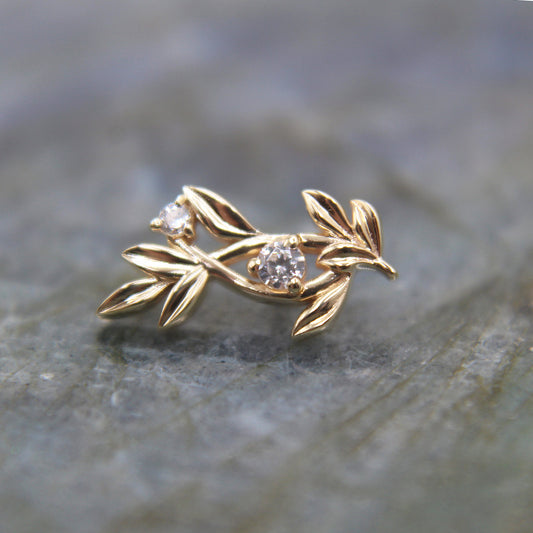 Cubic Zirconia Jessamine on background. Jewelry Stud. Yellow Gold. Earring. Cartilage Earring. Gold Jewelry. BVLA. Body Vision Los Angeles Jewelry. Brooklyn Piercing Jewelry