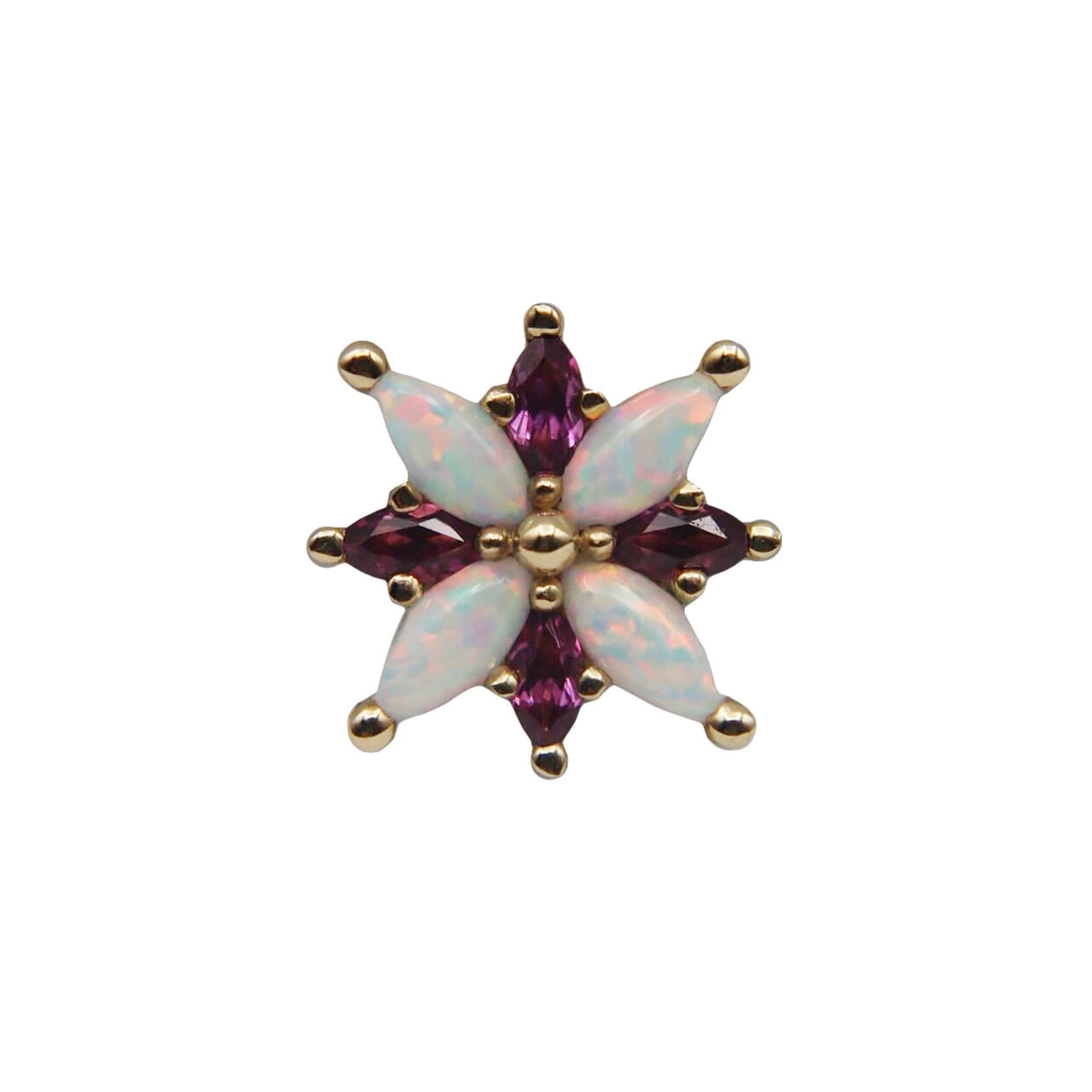 Star-shaped gemstone with opal and pink gemstones on a white background