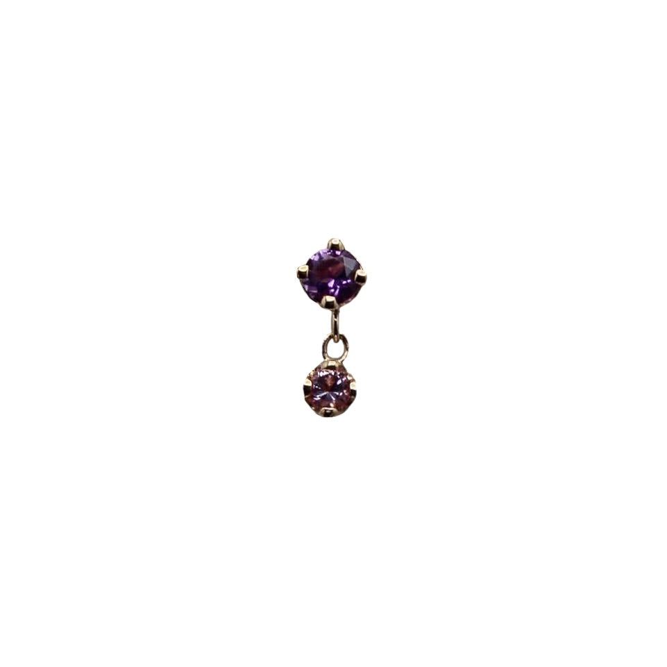 
                  
                    BVLA's "Duet" in 14k Yellow Gold gold with 1 Dark amethyst and 1 Light amethyst attached by 2 chain links
                  
                