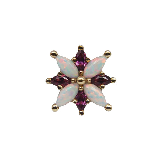 Star-shaped gemstone with opal and pink gemstones on a white background