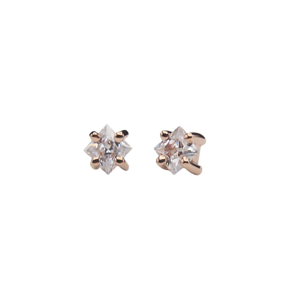 
                  
                    BVLA's "Princess Prong with Gem on Axis" in 14k Rose gold with CZ. Shown twice, straight on on the left side and slightly tilted towards the back on the right side
                  
                