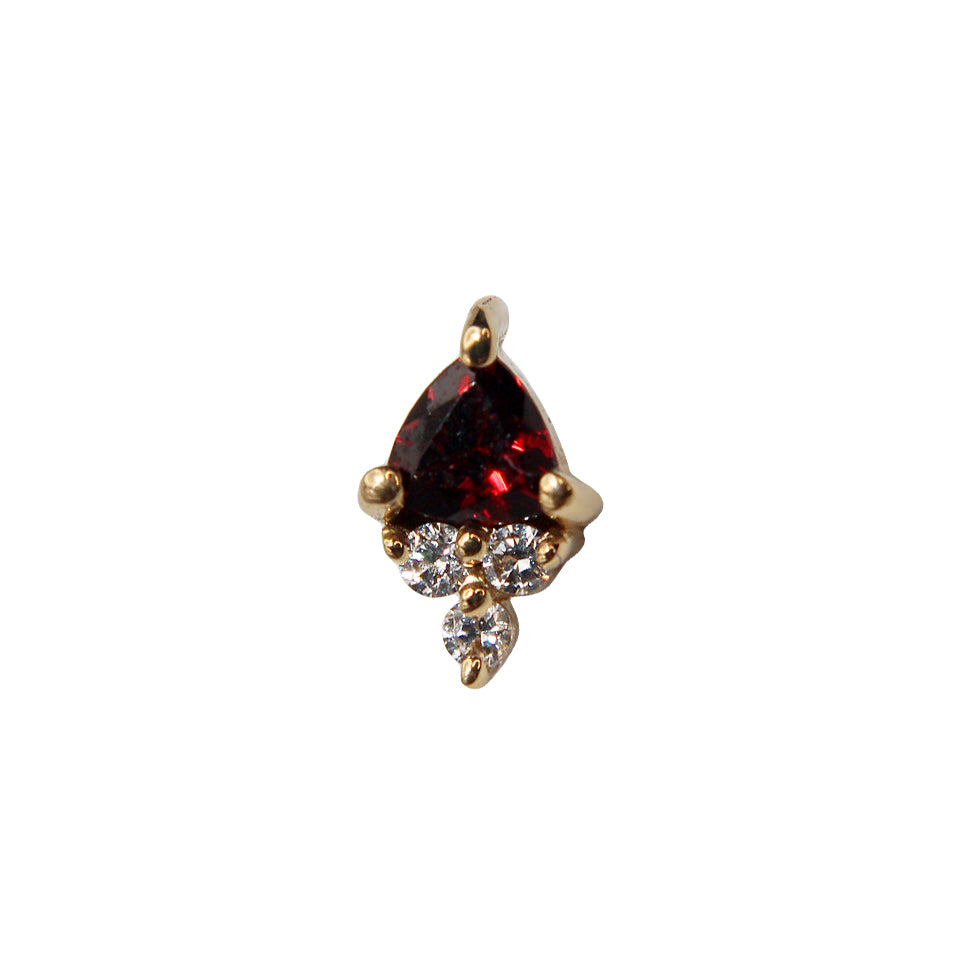 
                  
                    BVLA's "Tau" in 14k Yellow gold with 1 Garnet and 3 smaller CZ on the bottom
                  
                