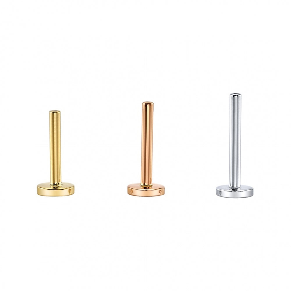 
                  
                    BVLA's "Threadless Labret Post" shown in 3 sizes. From left to right in 14k Yellow gold, 14k Rose gold and 14k White gold
                  
                